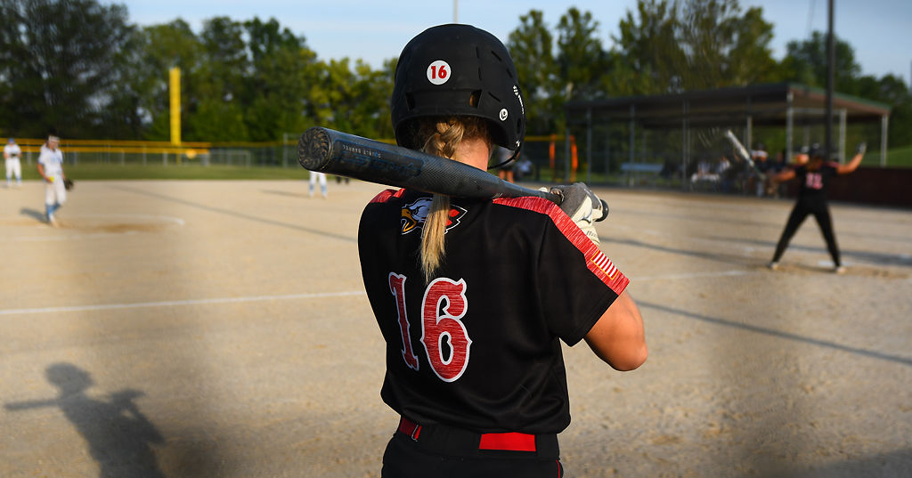 Addison Lange practices her swing